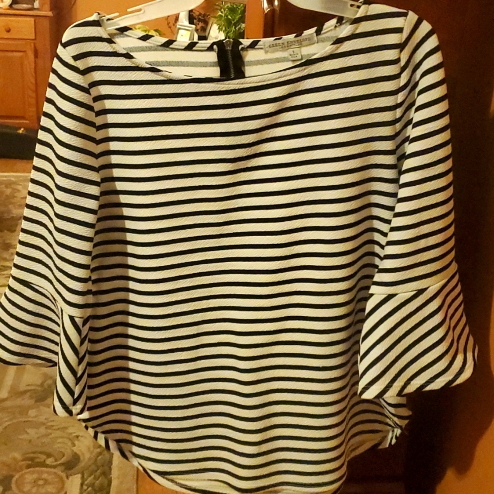 Oh so soft and comfy bell sleeve, dress up or down.
